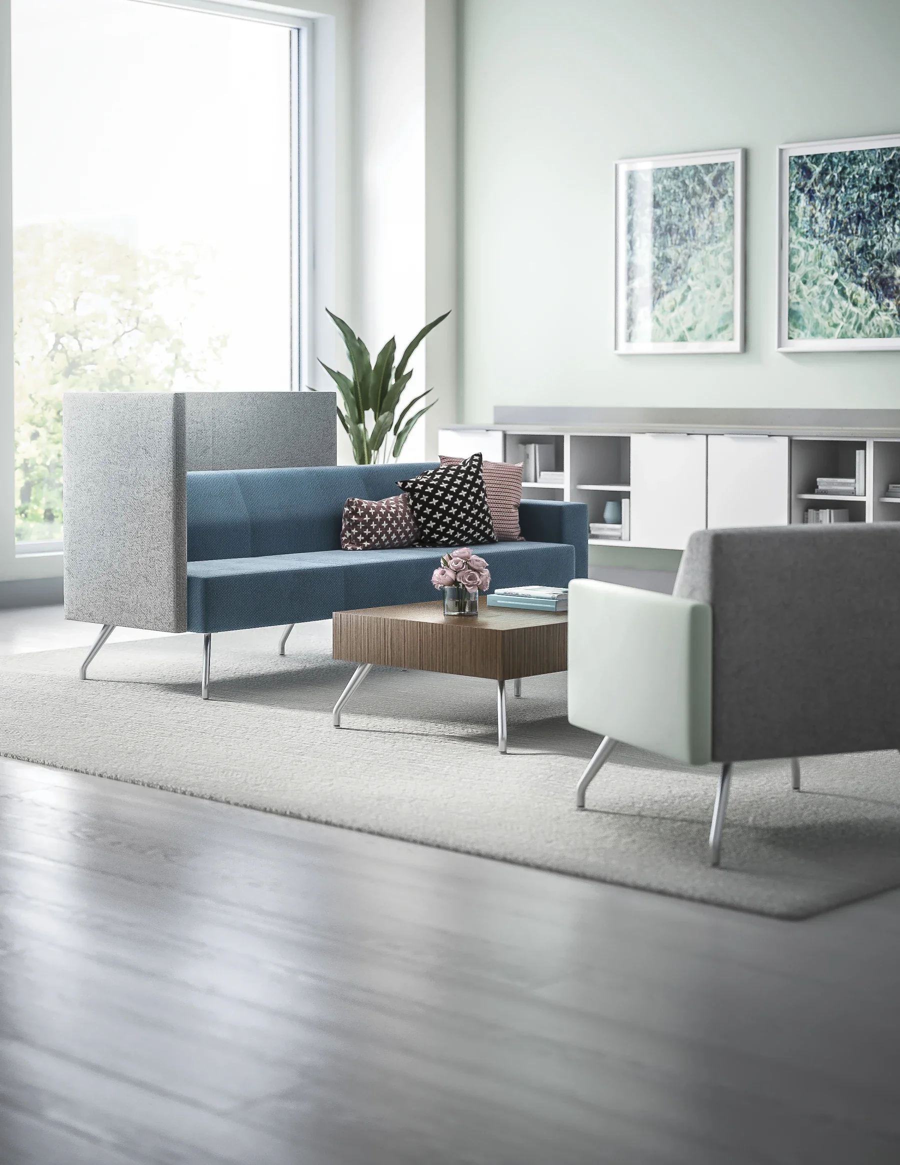 Healthcare-oriented waiting area with privacy-backed lounge seating.
