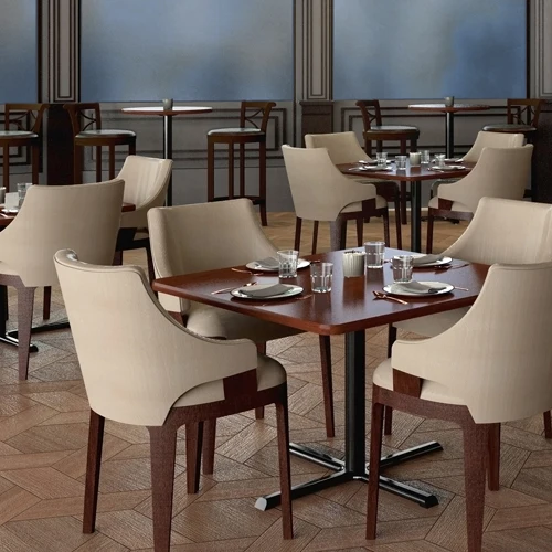 Square blue-top Correll café table with a black pedestal and cross base on a white background