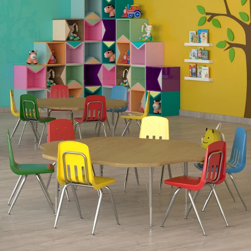 Curved wood-tone Correll activity table on four black metal legs against a white background