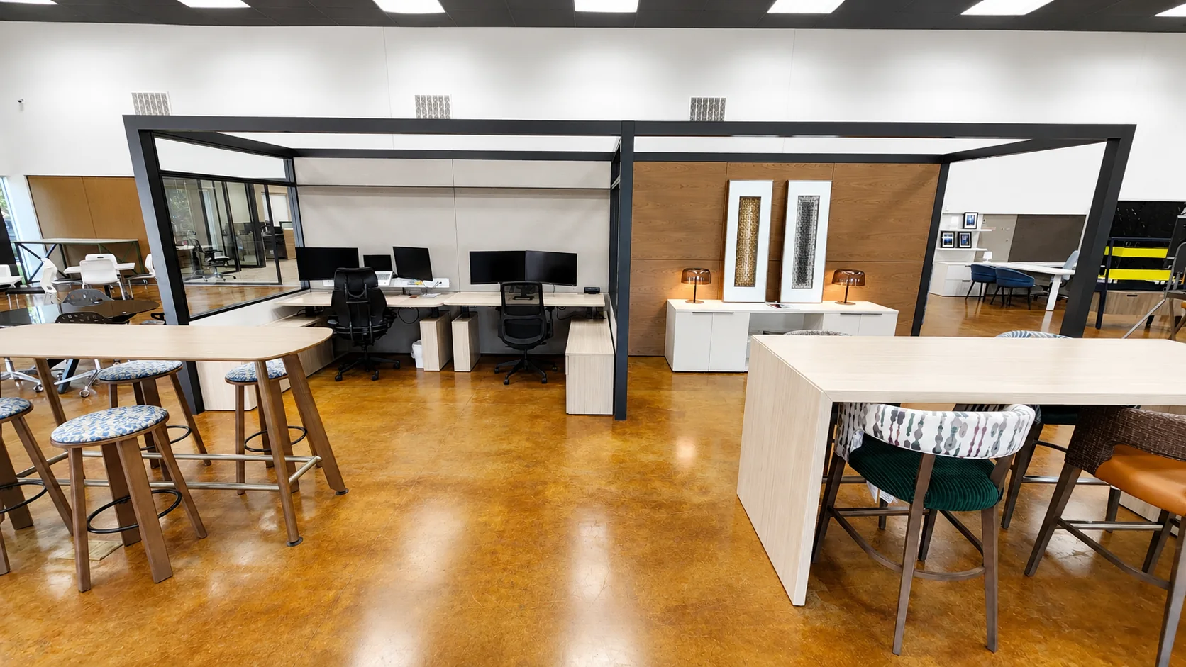 Workstations, tables, seating, and storage displays in the Pettus Interiors Little Rock showroom
