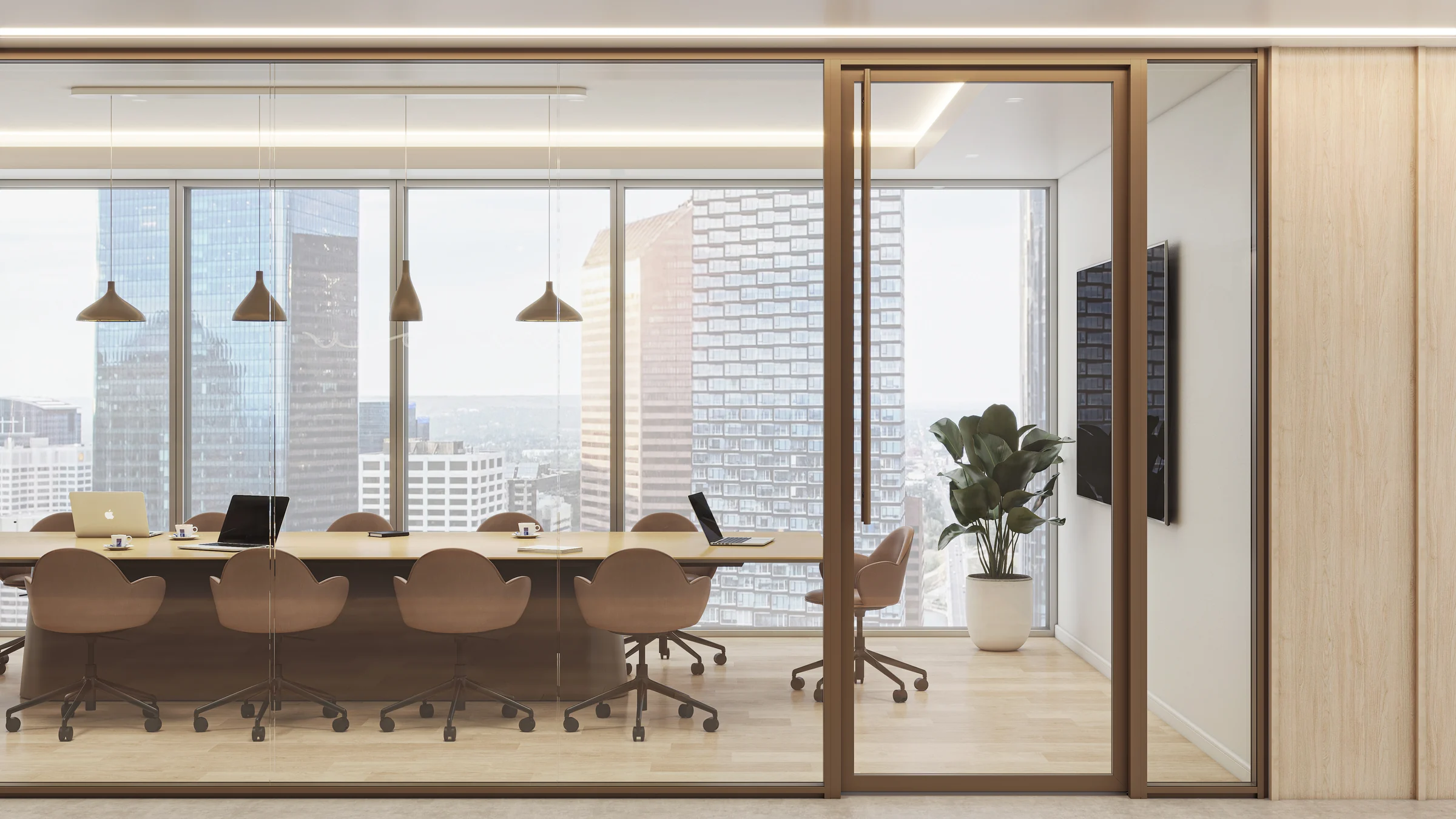 Focus wall system enclosing a meeting room with framed glass, a glass door, and adjacent solid fascia