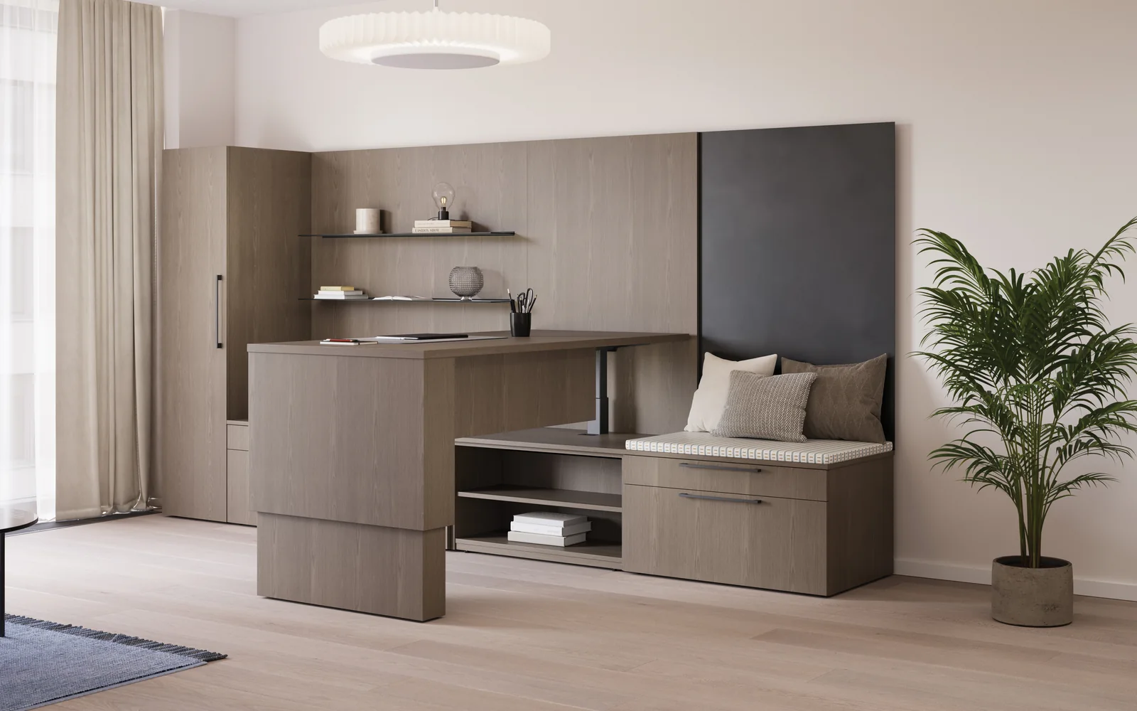 JSI private office with a wood desk, wall storage, open shelves, and a cushioned built-in seat