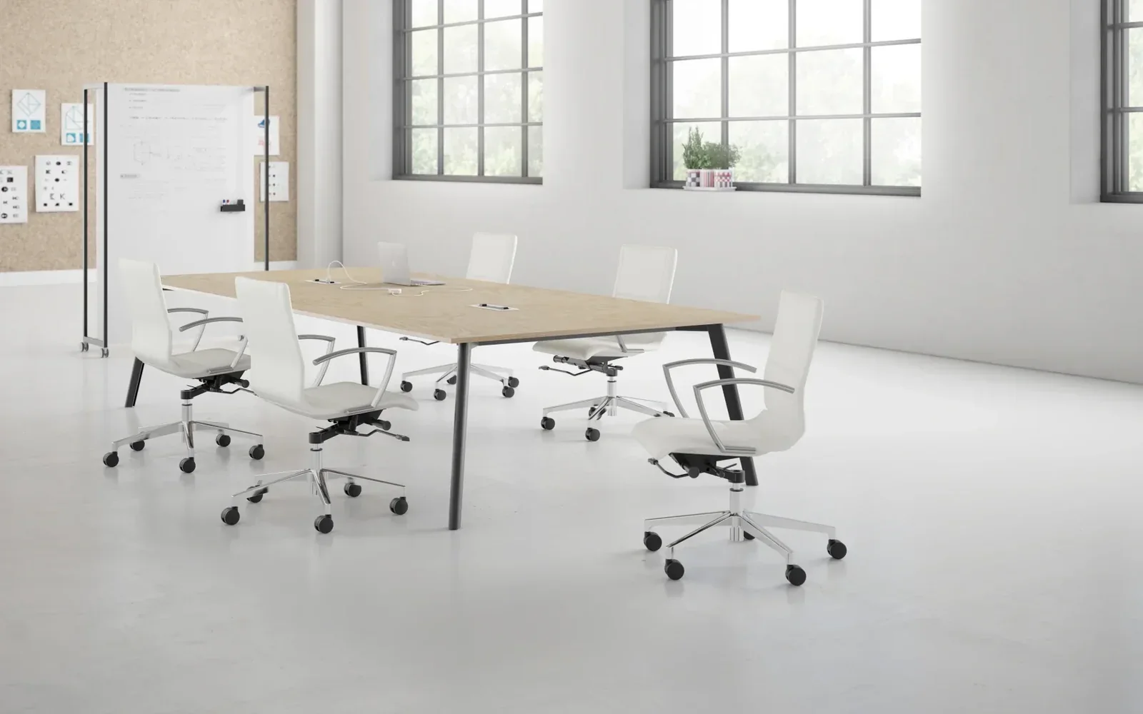 Kimball Niles meeting room with a light-wood conference table, white rolling chairs, large windows, and a presentation board
